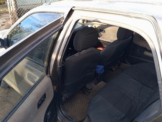 Сірий Ніссан Санні, об'ємом двигуна 1.5 л та пробігом 200 тис. км за 1200 $, фото 7 на Automoto.ua