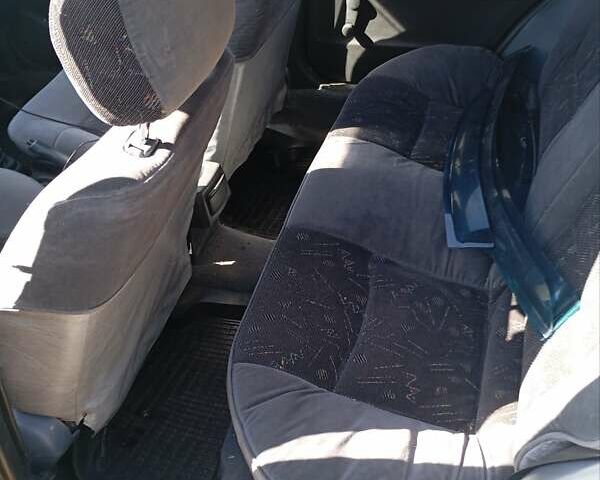 Серый Ниссан Санни, объемом двигателя 1.4 л и пробегом 280 тыс. км за 1600 $, фото 1 на Automoto.ua