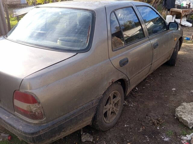 Сірий Ніссан Санні, об'ємом двигуна 1.5 л та пробігом 200 тис. км за 1200 $, фото 3 на Automoto.ua