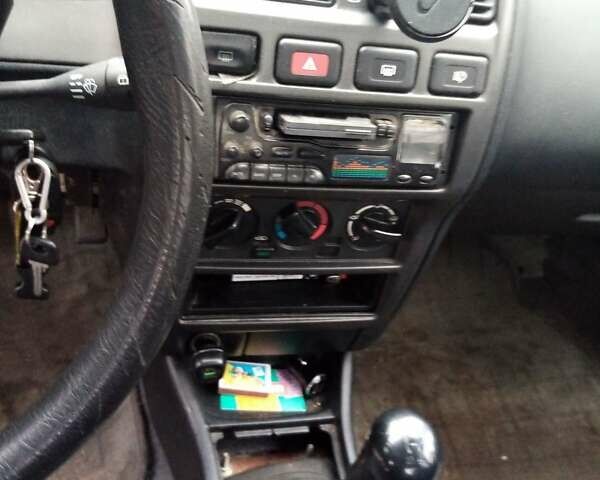 Серый Ниссан Санни, объемом двигателя 1.4 л и пробегом 370 тыс. км за 950 $, фото 9 на Automoto.ua