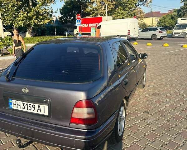 Серый Ниссан Санни, объемом двигателя 1.6 л и пробегом 2 тыс. км за 1500 $, фото 4 на Automoto.ua
