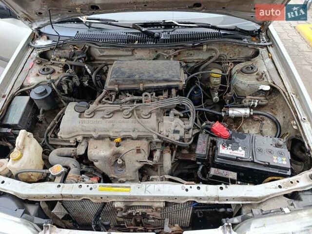 Серый Ниссан Санни, объемом двигателя 1.4 л и пробегом 270 тыс. км за 745 $, фото 7 на Automoto.ua