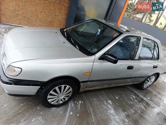 Серый Ниссан Санни, объемом двигателя 1.4 л и пробегом 270 тыс. км за 745 $, фото 2 на Automoto.ua