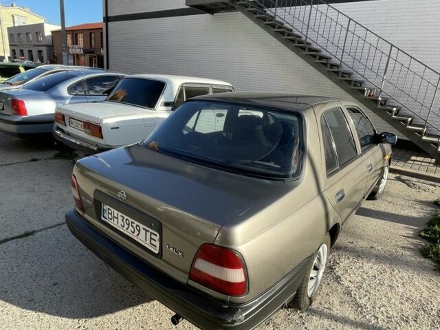 Серый Ниссан Санни, объемом двигателя 1.4 л и пробегом 325 тыс. км за 1100 $, фото 3 на Automoto.ua