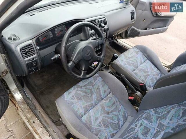 Серый Ниссан Санни, объемом двигателя 1.4 л и пробегом 270 тыс. км за 745 $, фото 5 на Automoto.ua