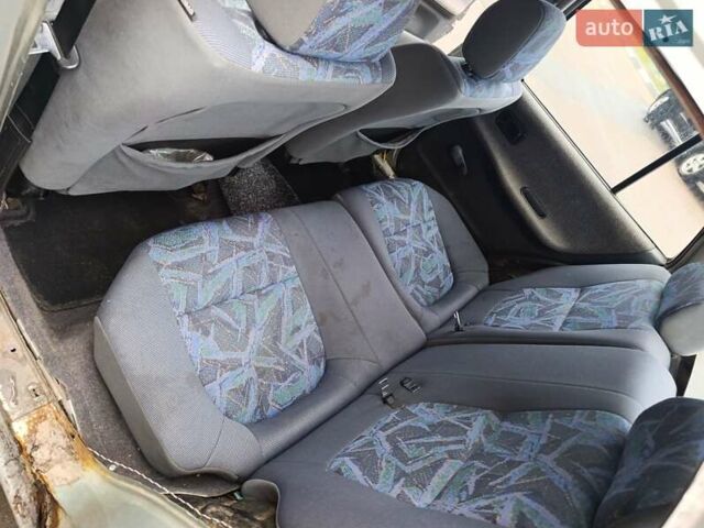 Серый Ниссан Санни, объемом двигателя 1.4 л и пробегом 270 тыс. км за 745 $, фото 6 на Automoto.ua