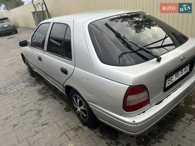 Серый Ниссан Санни, объемом двигателя 1.39 л и пробегом 250 тыс. км за 1700 $, фото 2 на Automoto.ua