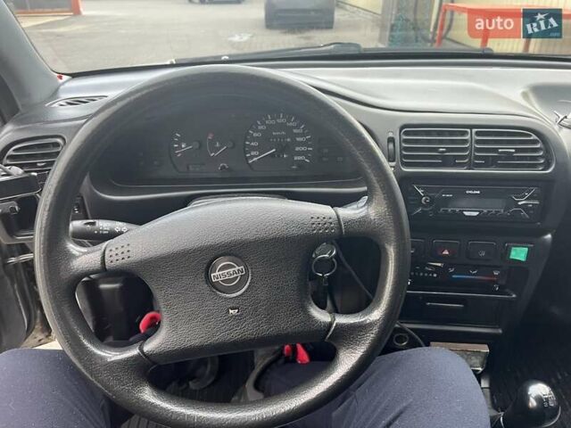 Серый Ниссан Санни, объемом двигателя 1.39 л и пробегом 250 тыс. км за 1700 $, фото 3 на Automoto.ua
