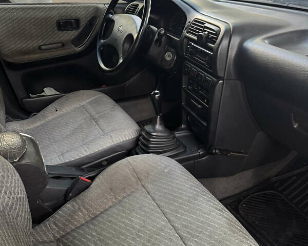 Сірий Ніссан Санні, об'ємом двигуна 1.4 л та пробігом 281 тис. км за 2200 $, фото 7 на Automoto.ua