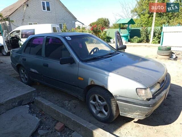Серый Ниссан Санни, объемом двигателя 1.39 л и пробегом 300 тыс. км за 1700 $, фото 1 на Automoto.ua