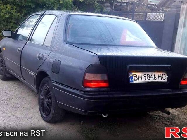 Серый Ниссан Санни, объемом двигателя 1.3 л и пробегом 300 тыс. км за 1200 $, фото 2 на Automoto.ua