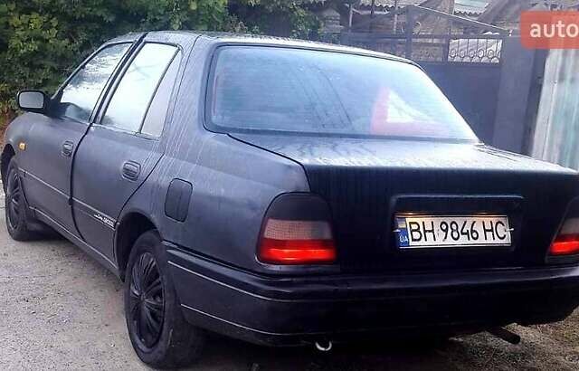 Серый Ниссан Санни, объемом двигателя 1.3 л и пробегом 300 тыс. км за 1200 $, фото 1 на Automoto.ua