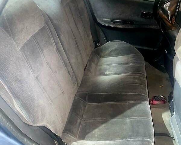 Серый Ниссан Санни, объемом двигателя 1.3 л и пробегом 300 тыс. км за 1200 $, фото 4 на Automoto.ua