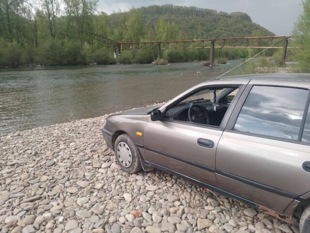 Серый Ниссан Санни, объемом двигателя 1 л и пробегом 303 тыс. км за 430 $, фото 10 на Automoto.ua