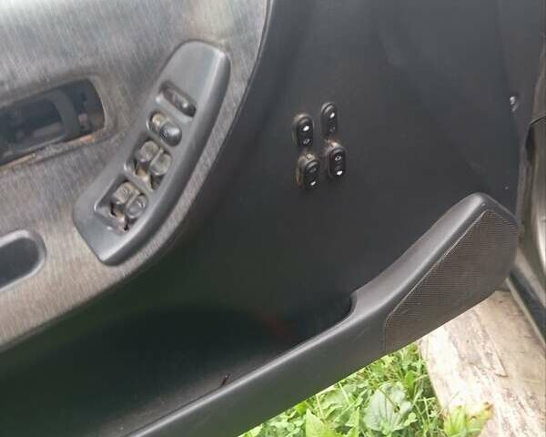 Серый Ниссан Санни, объемом двигателя 1.6 л и пробегом 303 тыс. км за 450 $, фото 4 на Automoto.ua