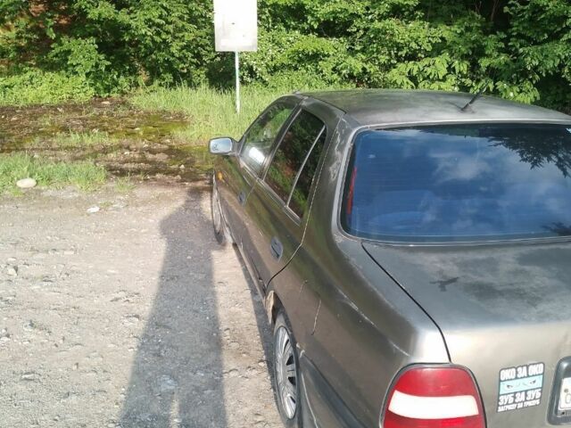 Серый Ниссан Санни, объемом двигателя 1 л и пробегом 303 тыс. км за 430 $, фото 7 на Automoto.ua