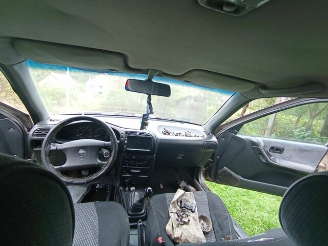 Серый Ниссан Санни, объемом двигателя 1 л и пробегом 303 тыс. км за 430 $, фото 16 на Automoto.ua