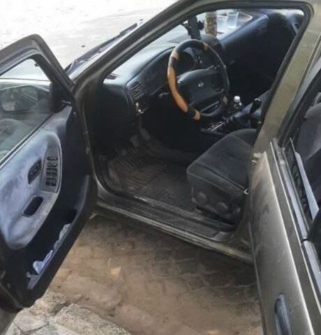 Серый Ниссан Санни, объемом двигателя 1 л и пробегом 303 тыс. км за 430 $, фото 4 на Automoto.ua