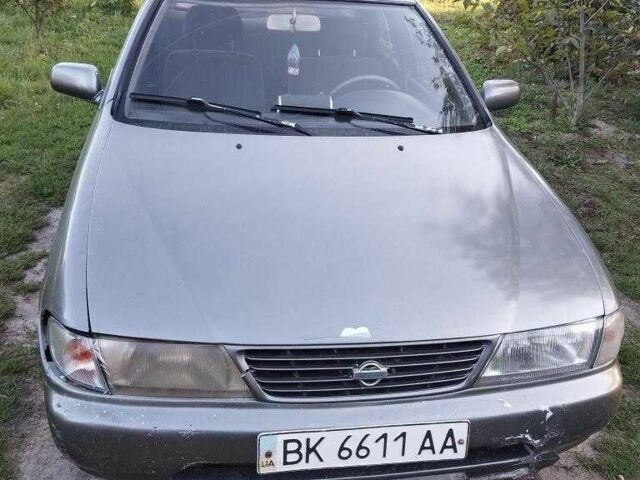 Серый Ниссан Санни, объемом двигателя 1.6 л и пробегом 999 тыс. км за 600 $, фото 1 на Automoto.ua