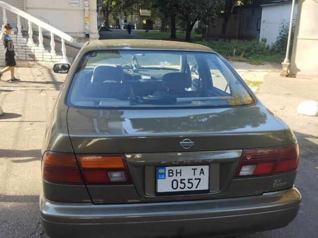 Серый Ниссан Санни, объемом двигателя 1.6 л и пробегом 427 тыс. км за 2000 $, фото 1 на Automoto.ua