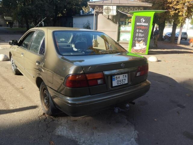 Серый Ниссан Санни, объемом двигателя 1.6 л и пробегом 427 тыс. км за 2000 $, фото 2 на Automoto.ua