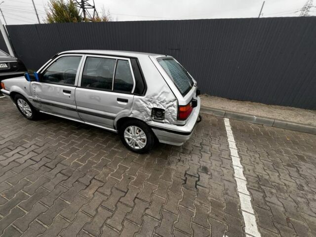 Серый Ниссан Санни, объемом двигателя 1.6 л и пробегом 150 тыс. км за 650 $, фото 5 на Automoto.ua