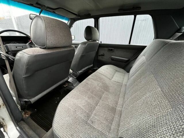 Серый Ниссан Санни, объемом двигателя 1.6 л и пробегом 150 тыс. км за 650 $, фото 6 на Automoto.ua