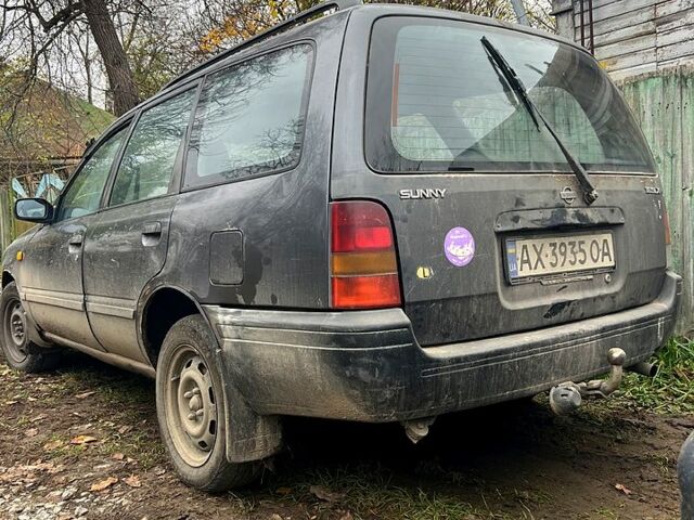 Серый Ниссан Санни, объемом двигателя 1.7 л и пробегом 300 тыс. км за 1000 $, фото 4 на Automoto.ua