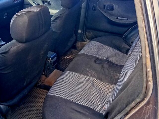 Серый Ниссан Санни, объемом двигателя 2 л и пробегом 350 тыс. км за 1500 $, фото 5 на Automoto.ua