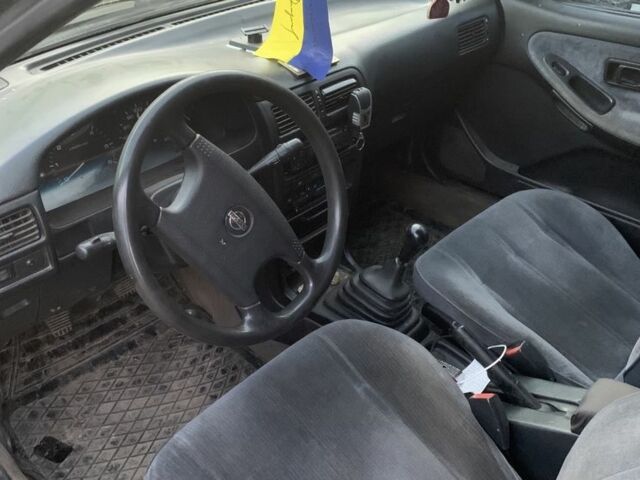 Серый Ниссан Санни, объемом двигателя 2 л и пробегом 450 тыс. км за 1000 $, фото 3 на Automoto.ua