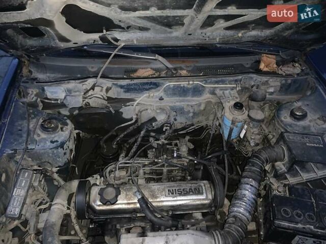 Синий Ниссан Санни, объемом двигателя 1.68 л и пробегом 300 тыс. км за 800 $, фото 11 на Automoto.ua