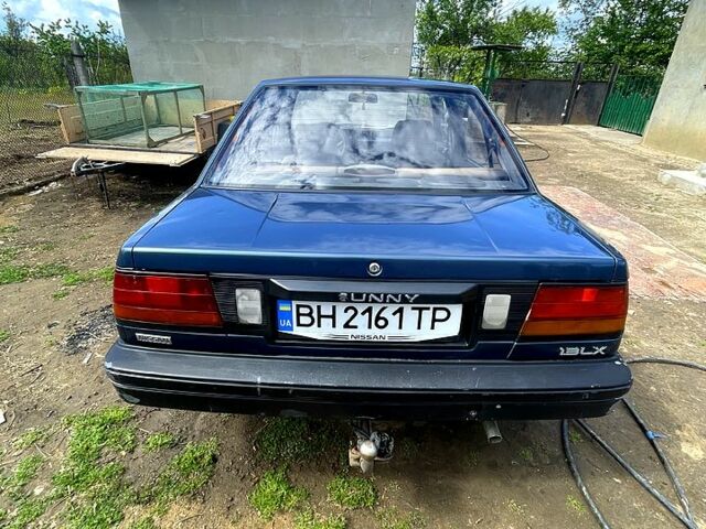 Синий Ниссан Санни, объемом двигателя 1.3 л и пробегом 386 тыс. км за 1450 $, фото 3 на Automoto.ua