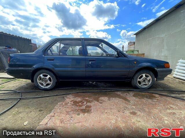 Синий Ниссан Санни, объемом двигателя 1.3 л и пробегом 386 тыс. км за 1450 $, фото 1 на Automoto.ua