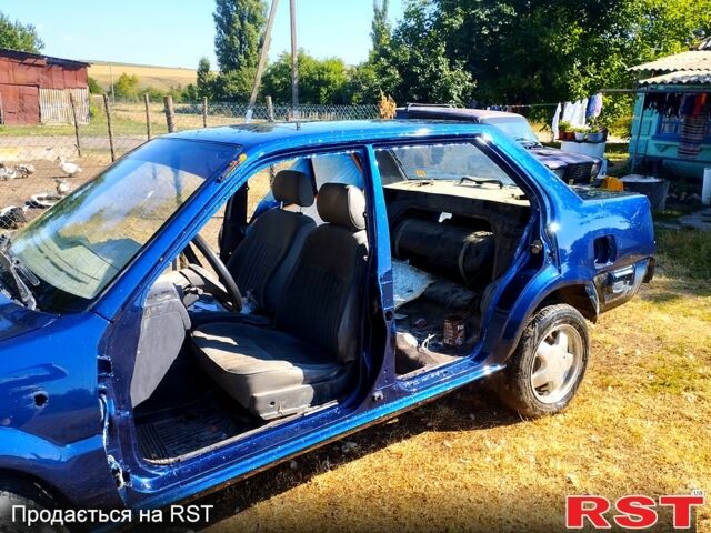 Синий Ниссан Санни, объемом двигателя 1.4 л и пробегом 148 тыс. км за 900 $, фото 7 на Automoto.ua