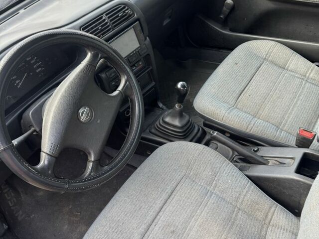 Синий Ниссан Санни, объемом двигателя 1.4 л и пробегом 400 тыс. км за 750 $, фото 4 на Automoto.ua