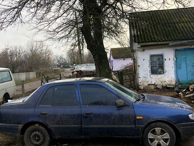 Синий Ниссан Санни, объемом двигателя 1.4 л и пробегом 0 тыс. км за 900 $, фото 1 на Automoto.ua