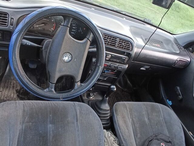 Синій Ніссан Санні, об'ємом двигуна 0 л та пробігом 500 тис. км за 1300 $, фото 5 на Automoto.ua