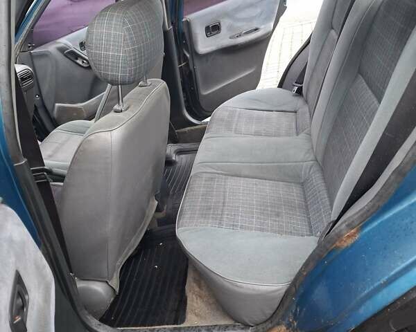 Синій Ніссан Санні, об'ємом двигуна 1.39 л та пробігом 295 тис. км за 1226 $, фото 8 на Automoto.ua