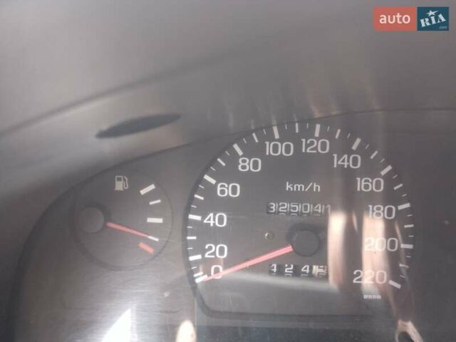 Синий Ниссан Санни, объемом двигателя 1.39 л и пробегом 325 тыс. км за 1350 $, фото 6 на Automoto.ua