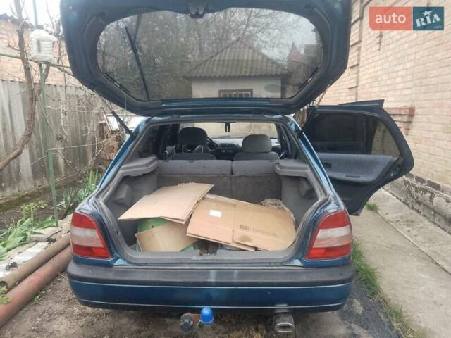 Синий Ниссан Санни, объемом двигателя 1.39 л и пробегом 325 тыс. км за 1350 $, фото 3 на Automoto.ua