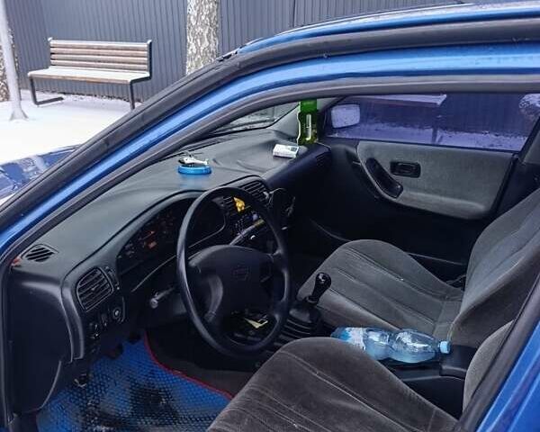 Синий Ниссан Санни, объемом двигателя 1.6 л и пробегом 1000 тыс. км за 2000 $, фото 6 на Automoto.ua