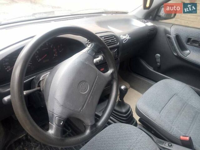 Синий Ниссан Санни, объемом двигателя 1.39 л и пробегом 325 тыс. км за 1350 $, фото 5 на Automoto.ua