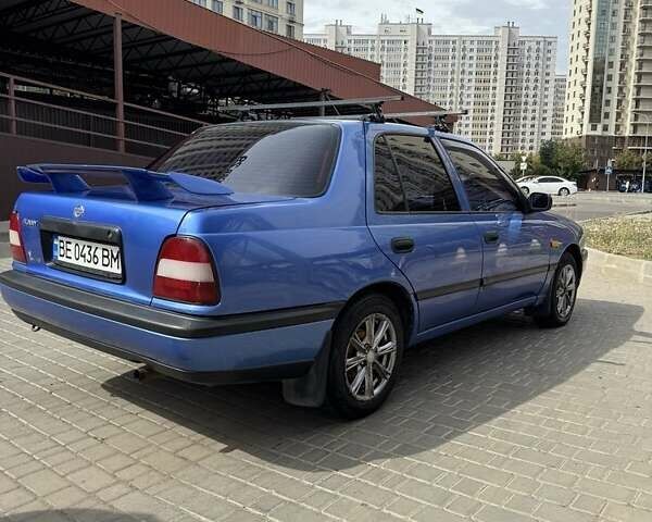 Синий Ниссан Санни, объемом двигателя 1.4 л и пробегом 300 тыс. км за 2000 $, фото 1 на Automoto.ua