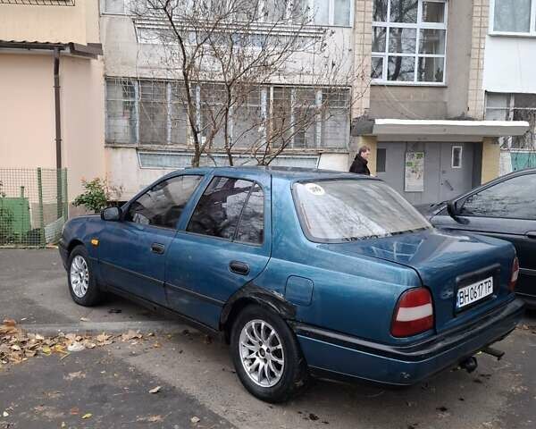 Синій Ніссан Санні, об'ємом двигуна 1.39 л та пробігом 295 тис. км за 1226 $, фото 5 на Automoto.ua