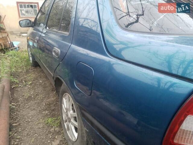 Синий Ниссан Санни, объемом двигателя 1.39 л и пробегом 325 тыс. км за 1350 $, фото 7 на Automoto.ua