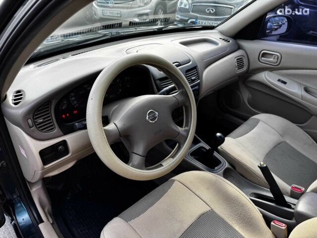 Синий Ниссан Санни, объемом двигателя 1.8 л и пробегом 158 тыс. км за 3590 $, фото 11 на Automoto.ua