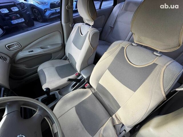 Синий Ниссан Санни, объемом двигателя 1.8 л и пробегом 158 тыс. км за 3590 $, фото 17 на Automoto.ua