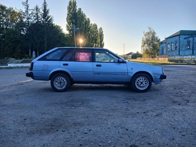 Синий Ниссан Санни, объемом двигателя 1.6 л и пробегом 1 тыс. км за 700 $, фото 5 на Automoto.ua