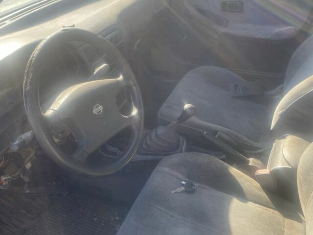 Синий Ниссан Санни, объемом двигателя 1.6 л и пробегом 400 тыс. км за 700 $, фото 4 на Automoto.ua