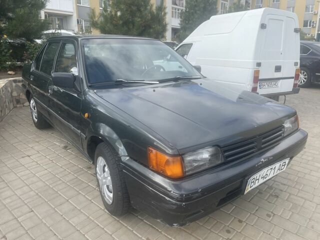 Зеленый Ниссан Санни, объемом двигателя 1.6 л и пробегом 288 тыс. км за 880 $, фото 1 на Automoto.ua